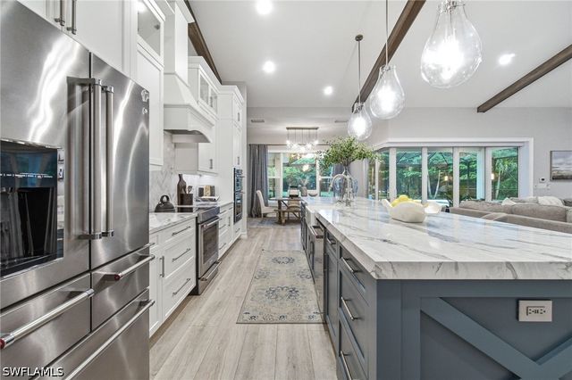 5737 Hidden Oaks LN, Naples, FL 34119