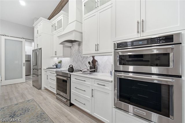 5737 Hidden Oaks LN, Naples, FL 34119