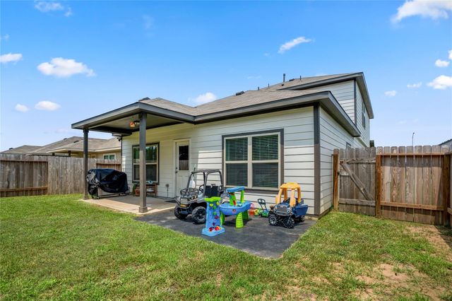 210 Bellewood Manor Drive, Magnolia, TX 77354
