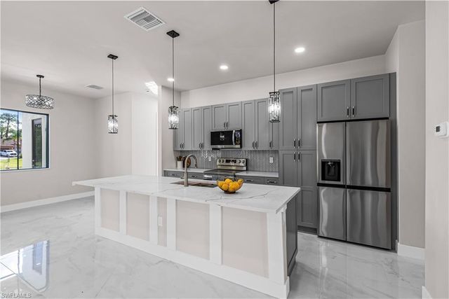 2713 10th ST W, Lehigh Acres, FL 33971