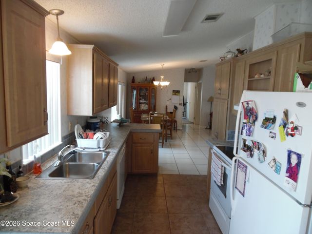 839 Wren Circle, Barefoot Bay, FL 32976