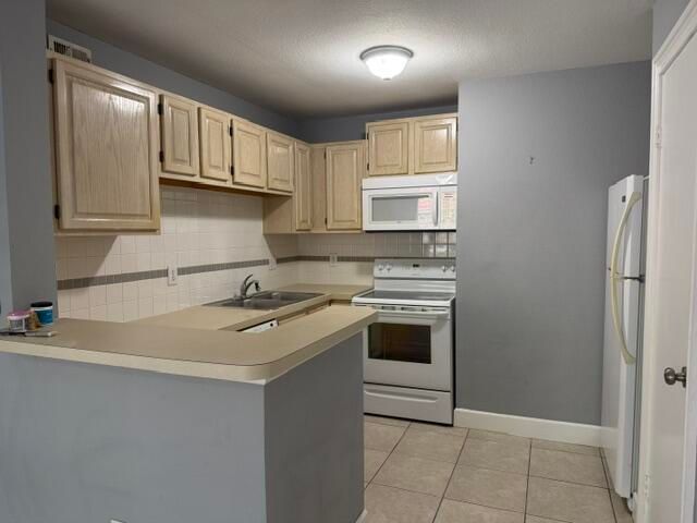 1865 Palm Cove Boulevard 9-106, Delray Beach, FL 33445
