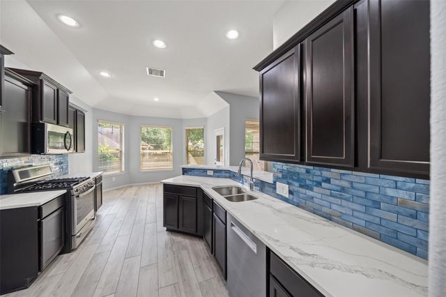 2406 Winter Trail Drive, Conroe, TX 77304