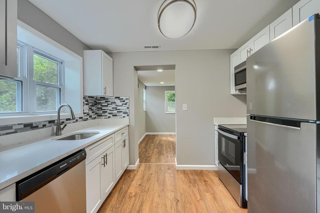 Image 11 of property listing at 7825 SURRATTS RD, Clinton, MD 20735