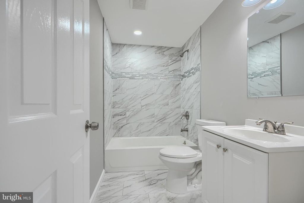 Image 23 of property listing at 7825 SURRATTS RD, Clinton, MD 20735
