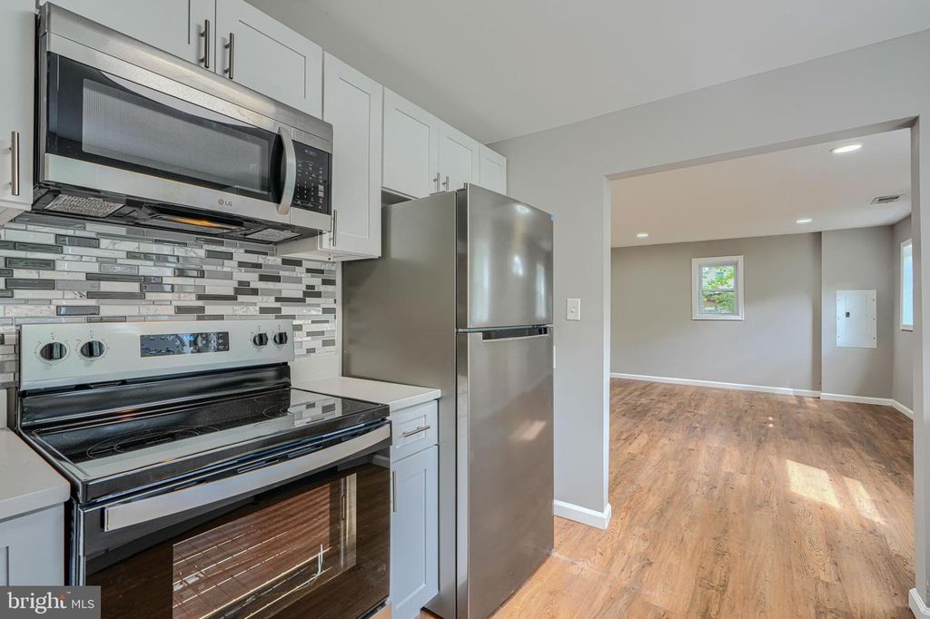 Image 8 of property listing at 7825 SURRATTS RD, Clinton, MD 20735