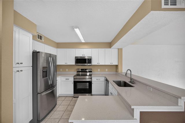 14013 FAIRWAY ISLAND DRIVE 428, Orlando, FL 32837