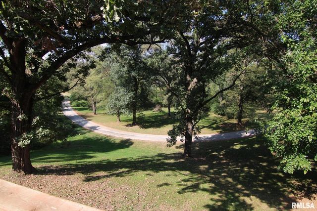 5 E TIMBERLINE Drive, Blue Grass, IA 52726