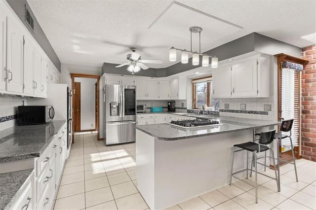 8113 W 99th Street, Overland Park, KS 66212