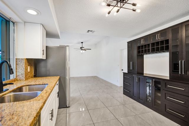 9855 Robins Nest Road, Boca Raton, FL 33496