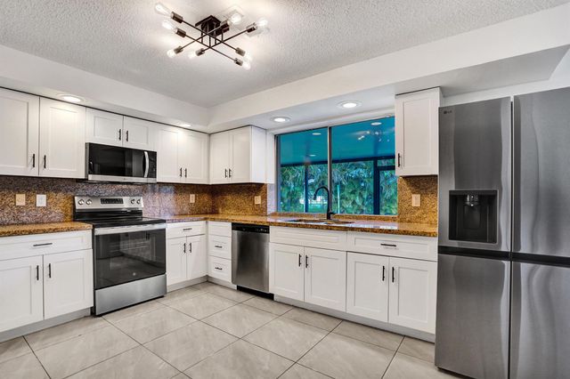 9855 Robins Nest Road, Boca Raton, FL 33496