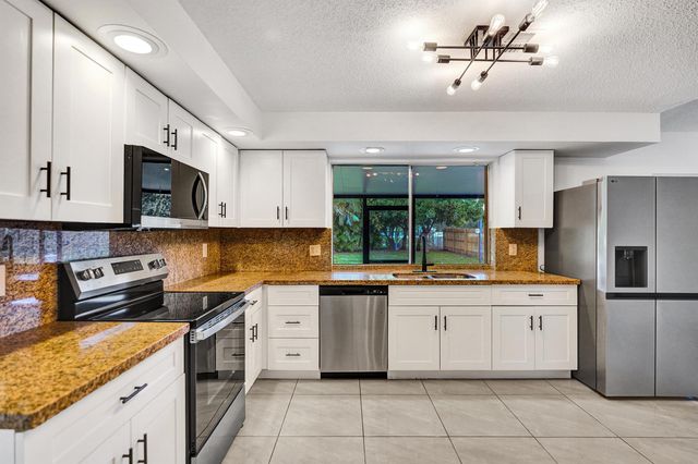 9855 Robins Nest Road, Boca Raton, FL 33496