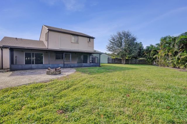 9855 Robins Nest Road, Boca Raton, FL 33496