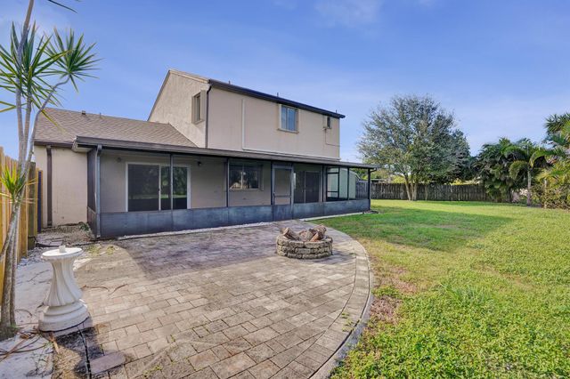 9855 Robins Nest Road, Boca Raton, FL 33496