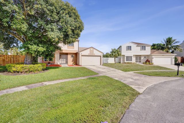 9855 Robins Nest Road, Boca Raton, FL 33496