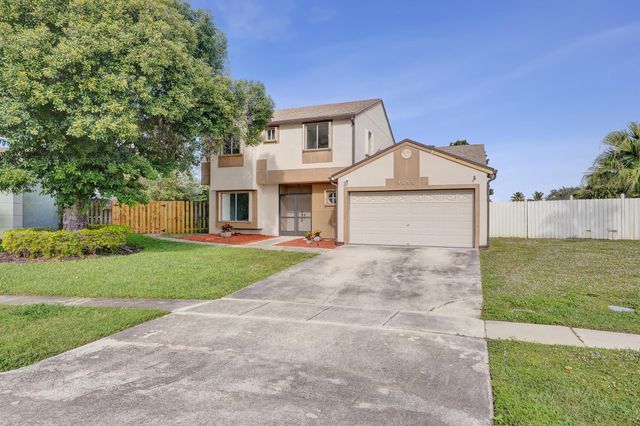 9855 Robins Nest Road, Boca Raton, FL 33496