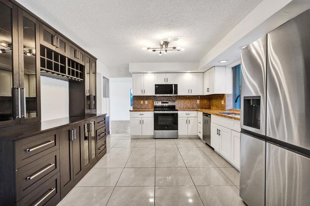 9855 Robins Nest Road, Boca Raton, FL 33496