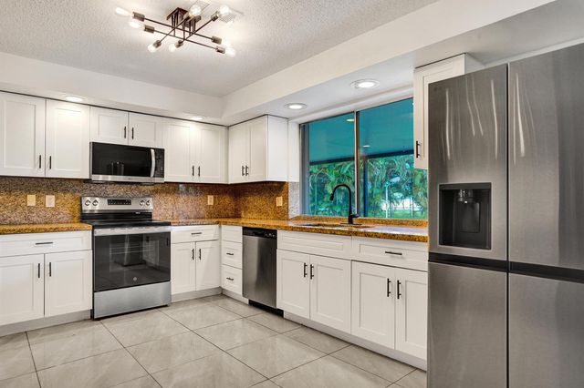 9855 Robins Nest Road, Boca Raton, FL 33496