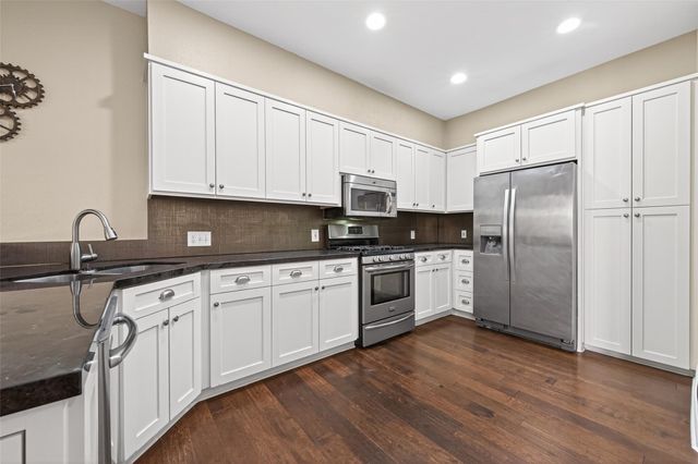 65 Scarlet Woods Court, Spring, TX 77380