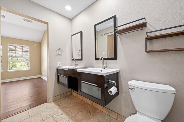 65 Scarlet Woods Court, Spring, TX 77380