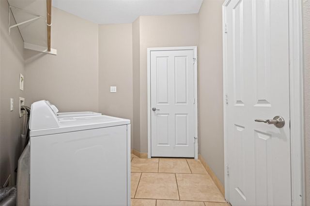 65 Scarlet Woods Court, Spring, TX 77380