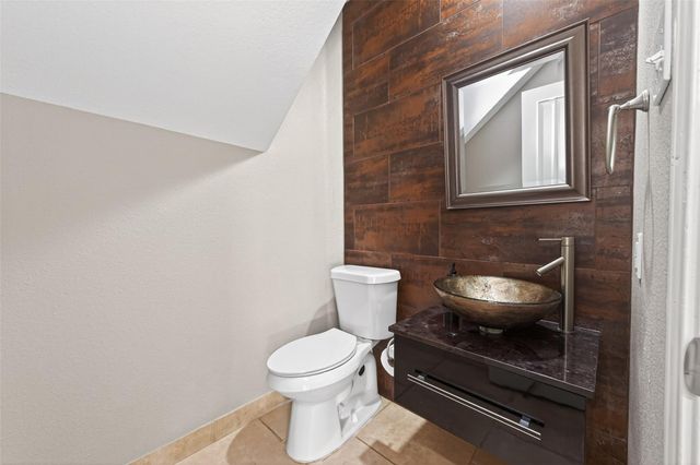 65 Scarlet Woods Court, Spring, TX 77380