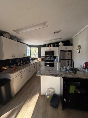 8602 TREASURE ISLAND ROAD, Leesburg, FL 34788