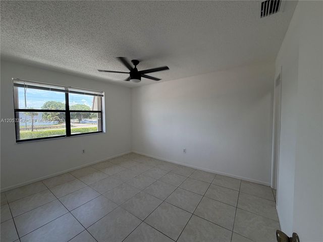 411 NW 100th Place 201, Pembroke Pines, FL 33024
