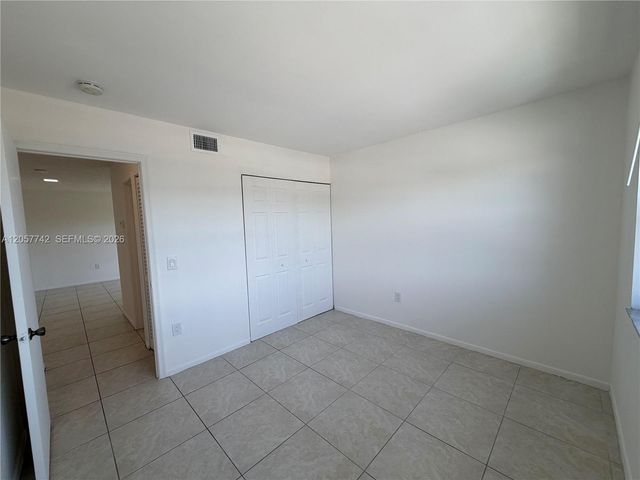 411 NW 100th Place 201, Pembroke Pines, FL 33024