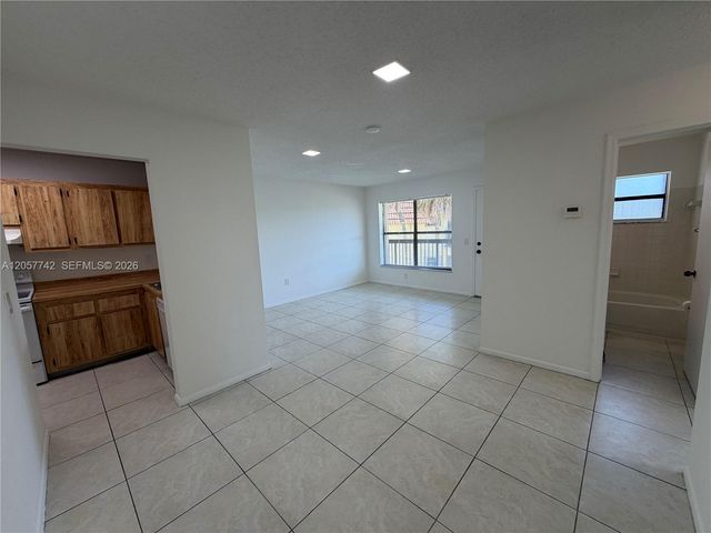 411 NW 100th Place 201, Pembroke Pines, FL 33024
