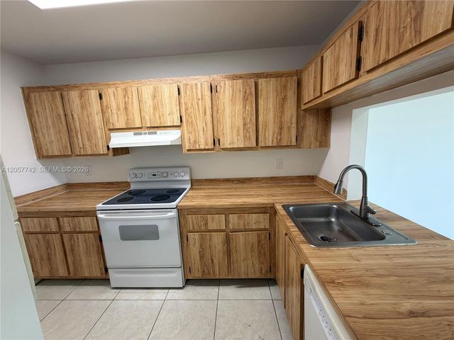 411 NW 100th Place 201, Pembroke Pines, FL 33024