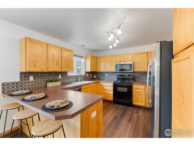 8805 Flaming Arrow Ave, Wellington, CO 80549