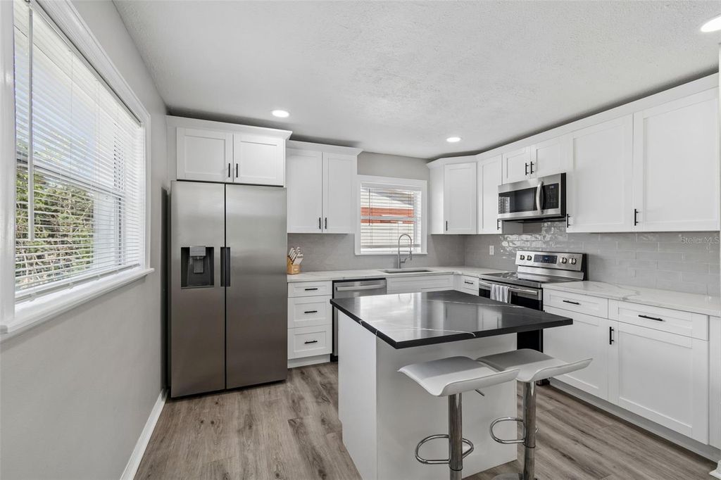 Image 12 of property listing at 7508 W CARACAS STREET, Tampa, FL 33615