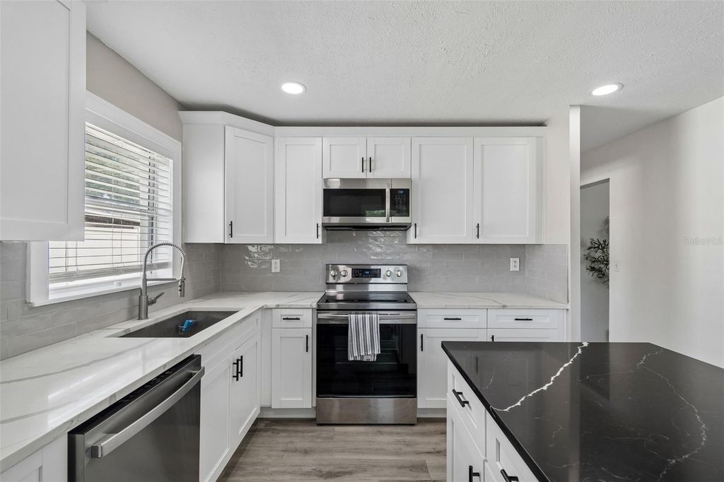 Image 13 of property listing at 7508 W CARACAS STREET, Tampa, FL 33615