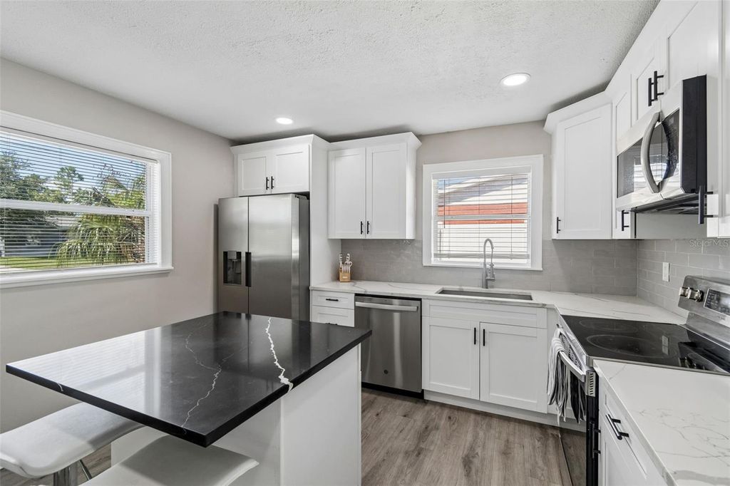 Image 14 of property listing at 7508 W CARACAS STREET, Tampa, FL 33615