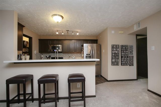 8051 Bay Branch Drive 323, The Woodlands, TX 77382
