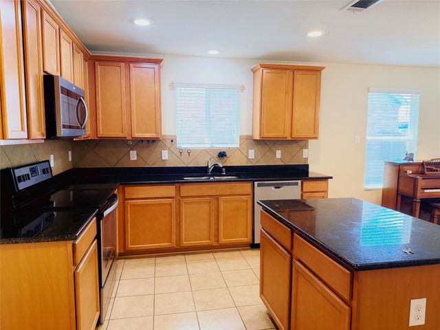 115 Waxberry Drive, Fate, TX 75189