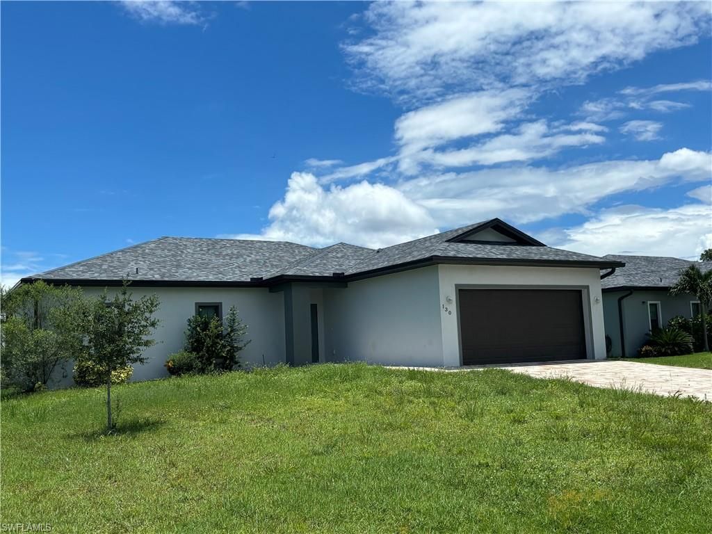 130 SW 37th AVE, CAPE CORAL, FL 33991 — photo 4