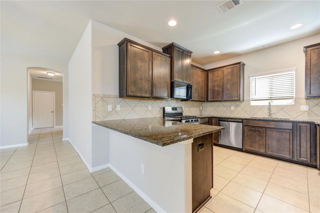 6430 Macroom Meadows Lane, Houston, TX 77048