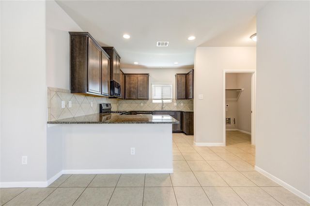 6430 Macroom Meadows Lane, Houston, TX 77048