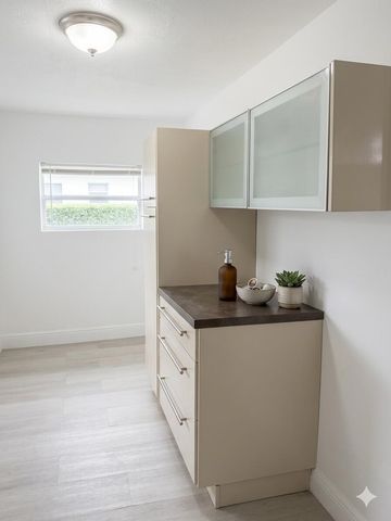 1527 NW 63rd Street, Miami, FL 33147