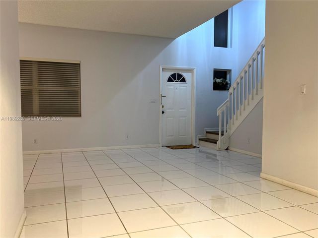 543 Racquet Club Rd 33, Weston, FL 33326