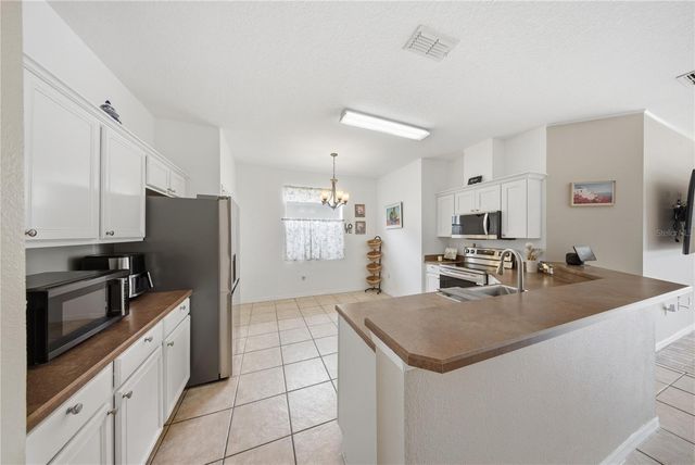 831 WHISPERING CYPRESS LANE, Orlando, FL 32824
