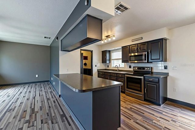 11327 GROVE STREET, Leesburg, FL 34788