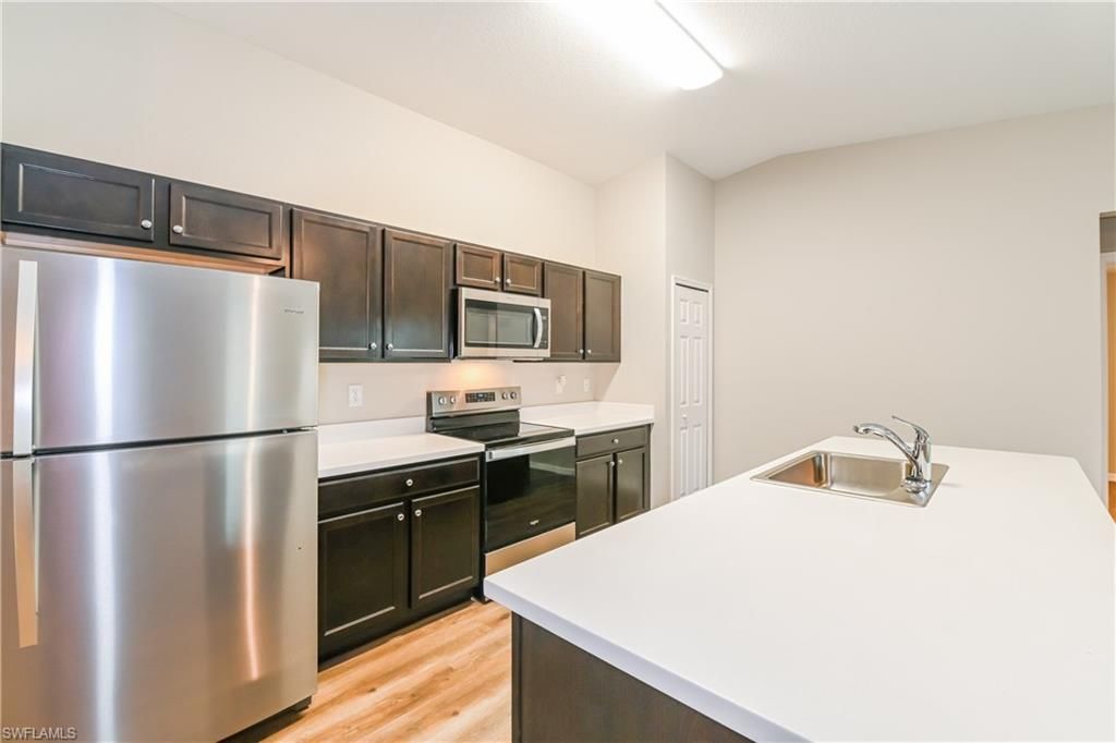 719 SW 13th TER, CAPE CORAL, FL 33991 — photo 4