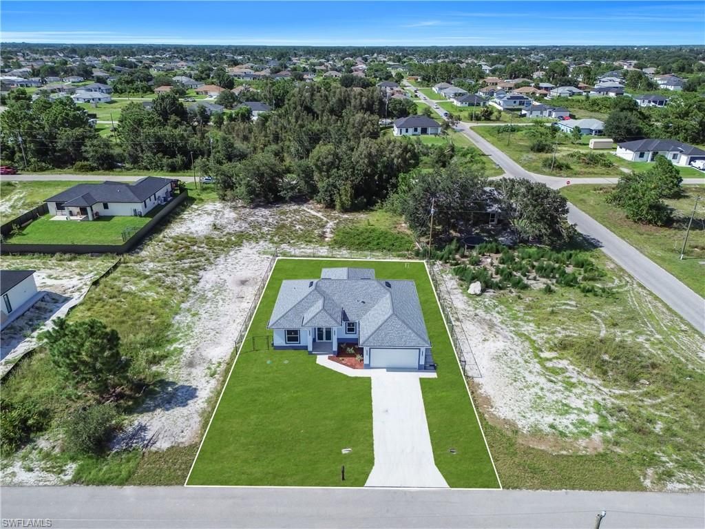 2702 30th ST SW, LEHIGH ACRES, FL 33976 — photo 4