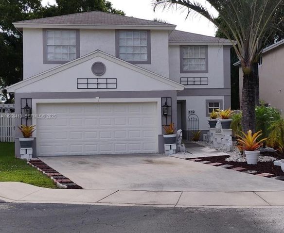 110 E Riverbend Dr, Sunrise, FL 33326