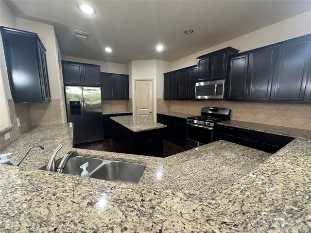 2423 Garden Shadow Drive, Conroe, TX 77384