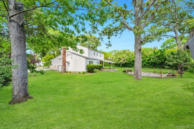 32 Chatham Woods Drive, Centereach, NY 11720