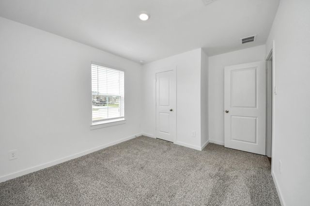 9035 Rose Water Trail, Iowa Colony, TX 77583